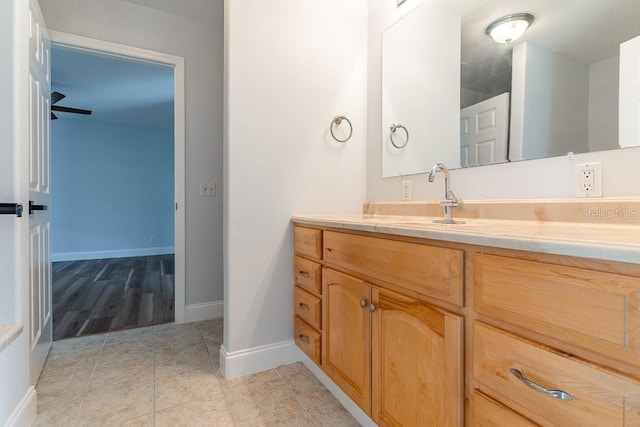 bathroom with vanity and tile patterned floors