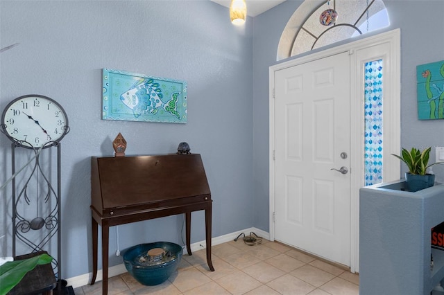 foyer with light tile patterned floors