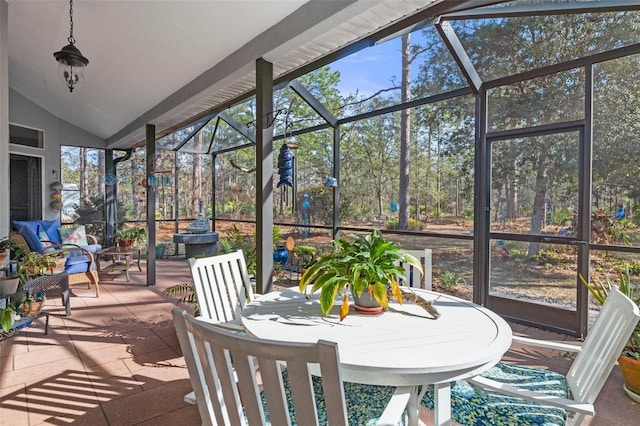 sunroom with vaulted ceiling