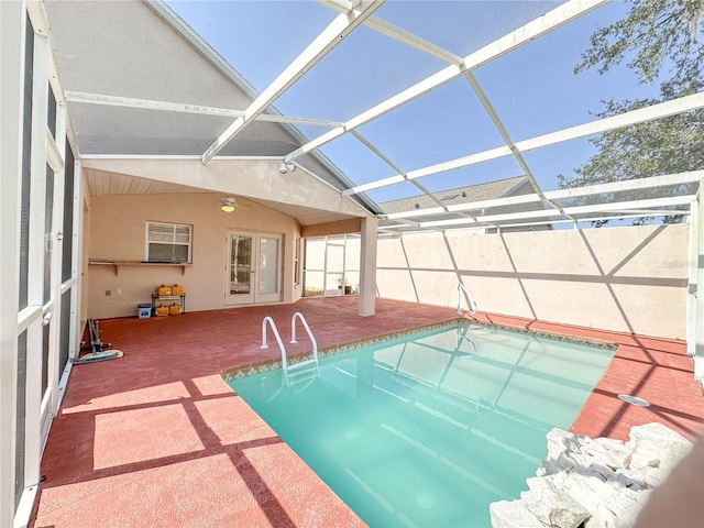 view of pool featuring a lanai and a patio area