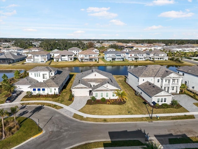 drone / aerial view featuring a water view