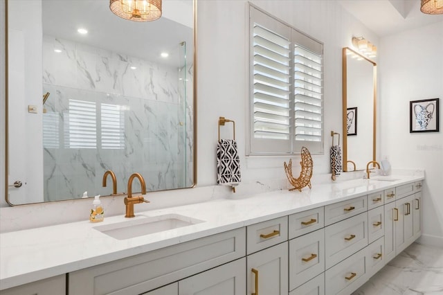 bathroom with vanity and a shower