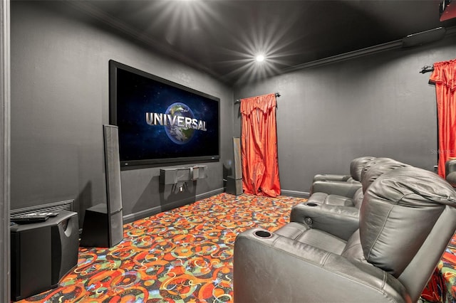 cinema room featuring ornamental molding