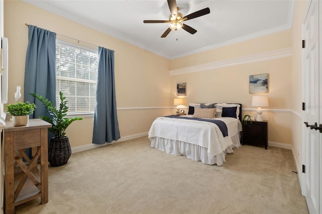 bedroom featuring ceiling fan, light colored carpet, and ornamental molding