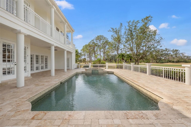 view of pool featuring a patio area