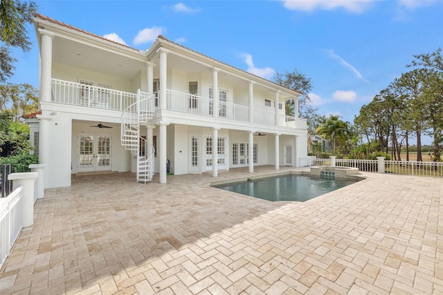 back of house featuring a patio, french doors, a balcony, and ceiling fan