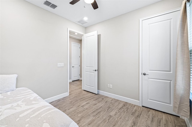 bedroom featuring ceiling fan and light wood-type flooring