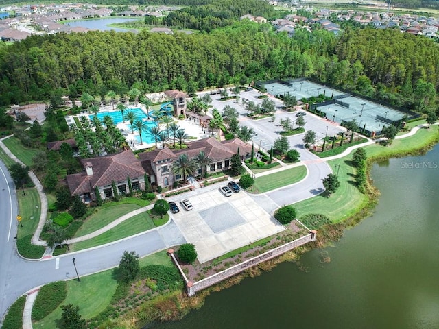 birds eye view of property featuring a water view