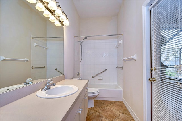 full bathroom with tiled shower / bath combo, vanity, tile patterned flooring, and toilet