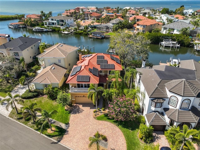 aerial view featuring a residential view and a water view