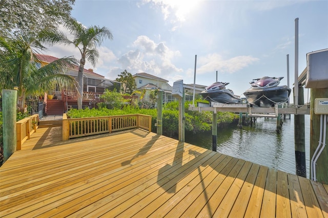 view of dock with a water view and boat lift