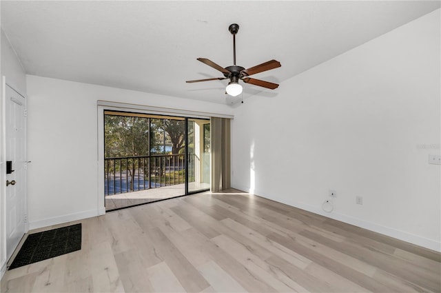 empty room featuring ceiling fan and light hardwood / wood-style floors