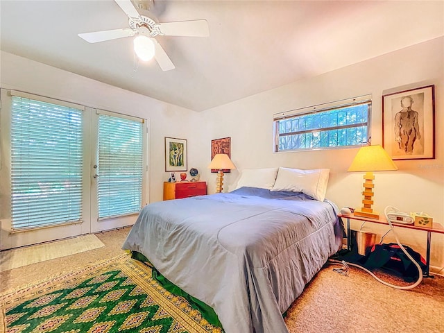 bedroom with access to outside and ceiling fan