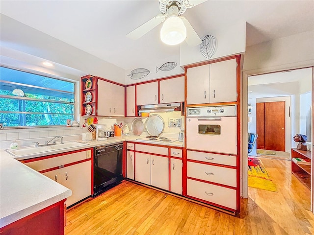 kitchen featuring backsplash, white appliances, sink, and white cabinets