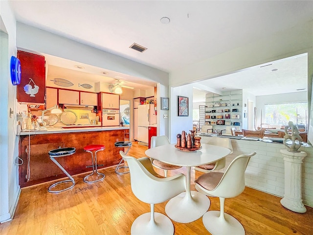 dining area featuring light hardwood / wood-style flooring