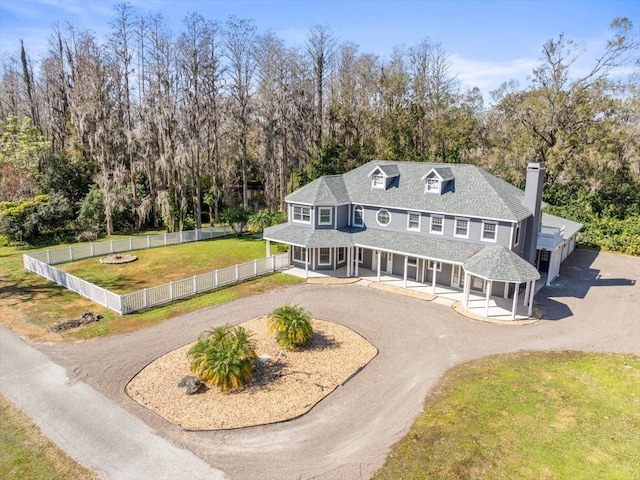 view of front of home with a front lawn and a porch