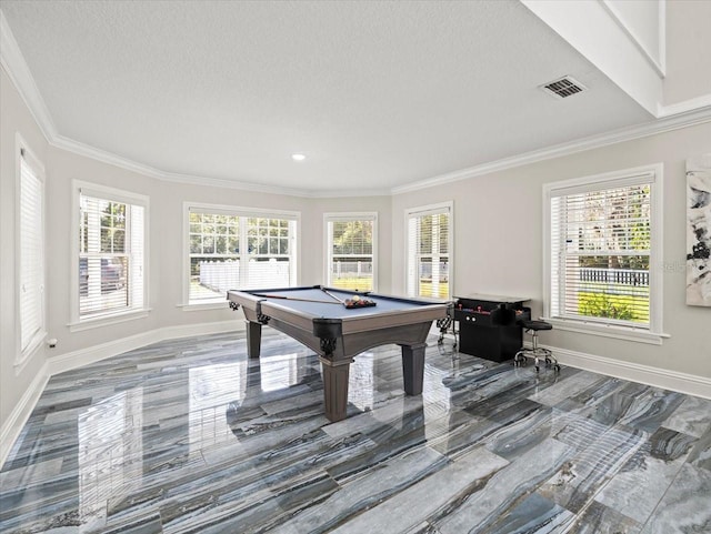 game room featuring crown molding, pool table, and a textured ceiling