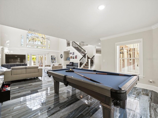 game room featuring french doors, pool table, and ornamental molding