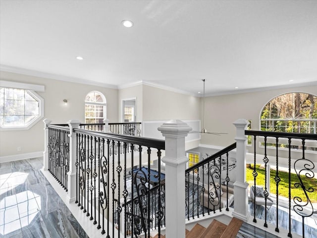 hallway featuring crown molding