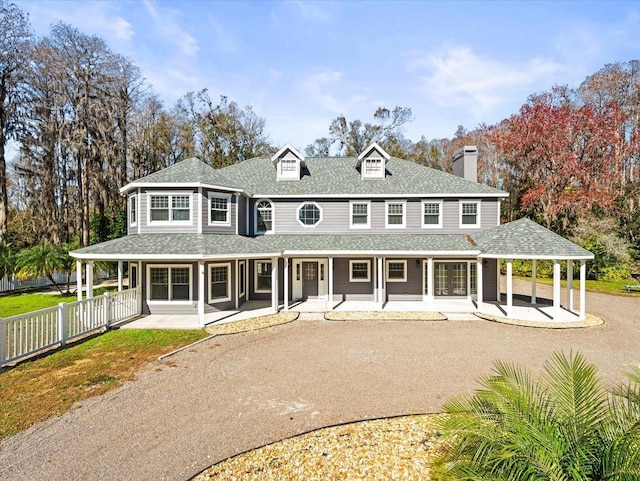 farmhouse-style home featuring a porch