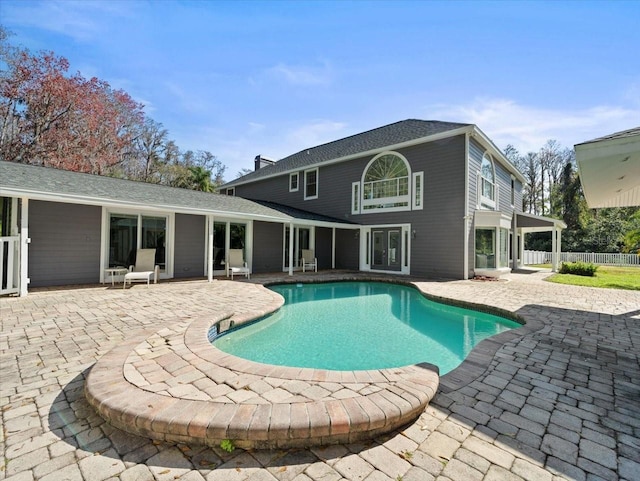 view of swimming pool with a patio