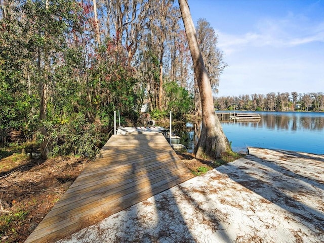 view of dock with a water view