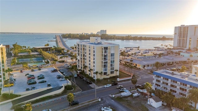 aerial view at dusk with a water view