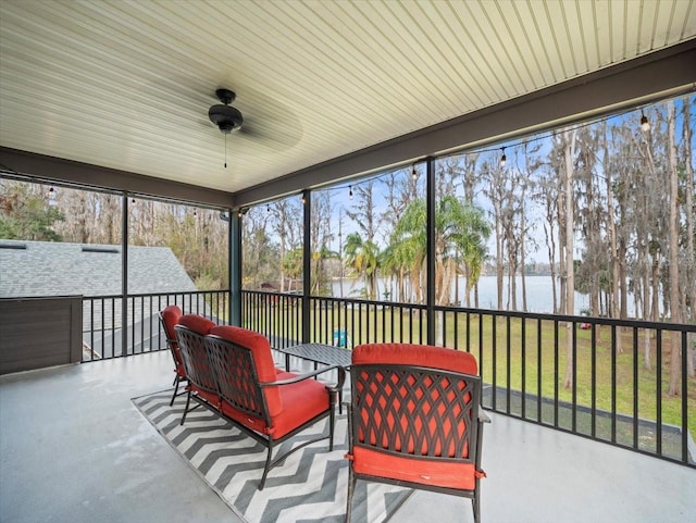 sunroom with a water view