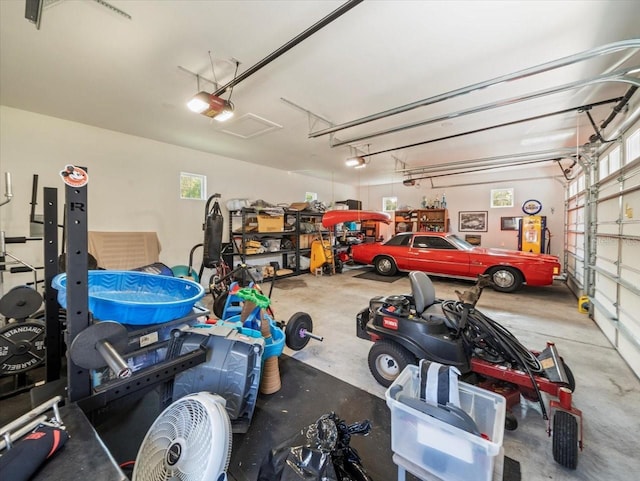 garage featuring a garage door opener