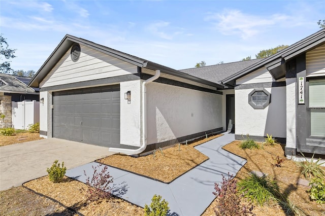 ranch-style home with a garage