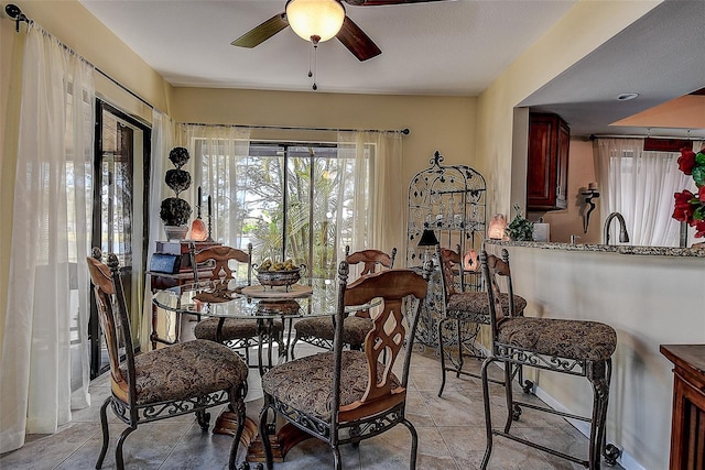 dining area featuring ceiling fan