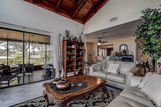 tiled living room with wood ceiling, ceiling fan, beam ceiling, and high vaulted ceiling