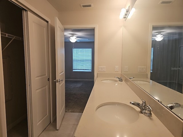 bathroom featuring tile patterned floors and vanity