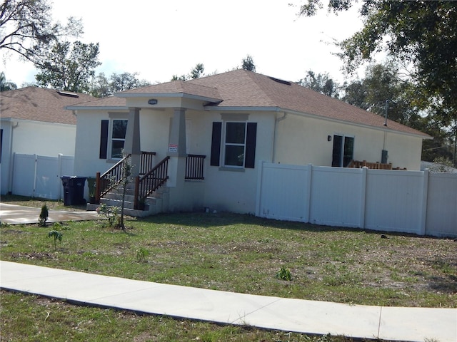 view of front of home with a front yard