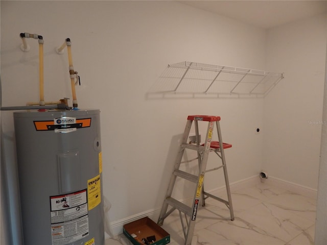 utility room featuring water heater