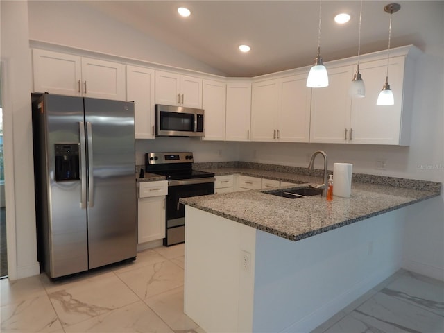 kitchen featuring white cabinetry, stainless steel appliances, kitchen peninsula, and sink