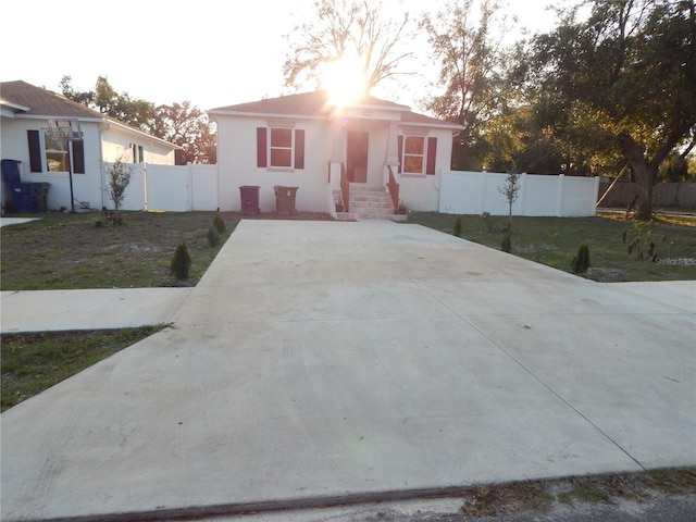 view of front of home with a front lawn