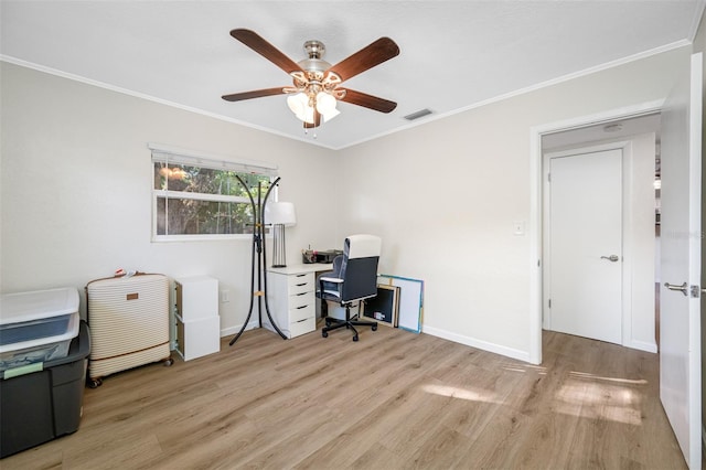 office space featuring ornamental molding, ceiling fan, and light wood-type flooring