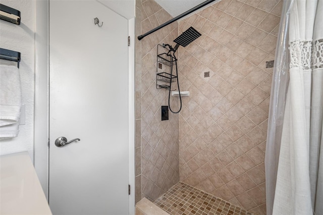 bathroom featuring a shower with curtain