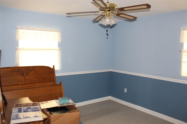 unfurnished room with carpet floors and ceiling fan