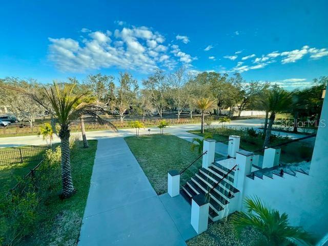 surrounding community featuring fence