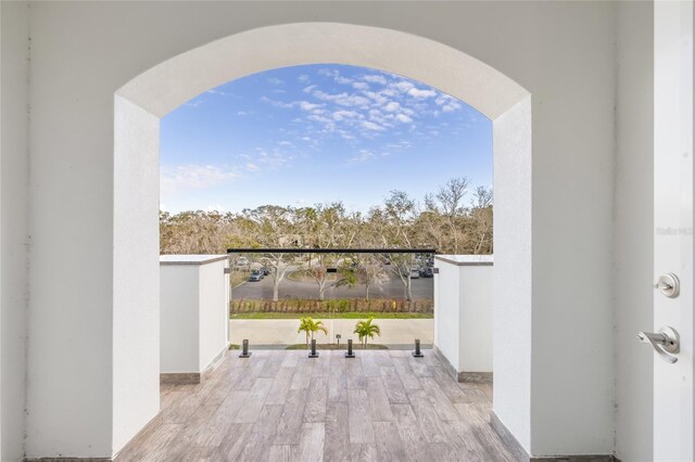 view of patio featuring a balcony