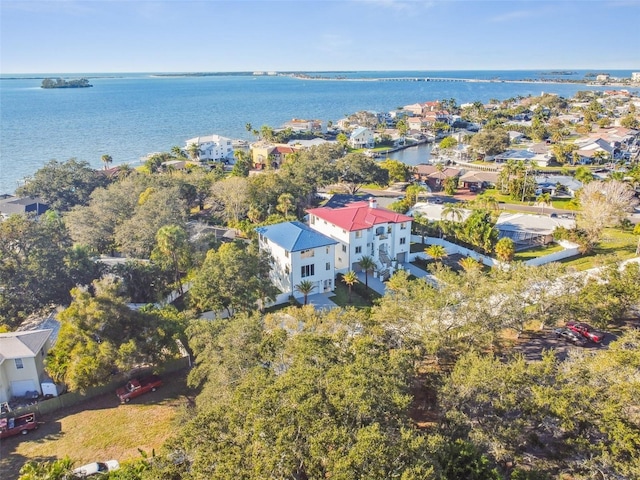 birds eye view of property featuring a water view and a residential view