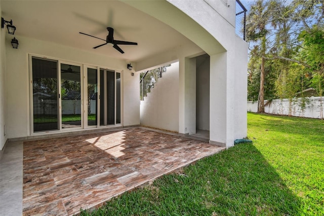 view of patio featuring ceiling fan