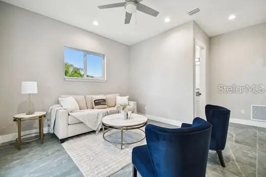 living room with ceiling fan