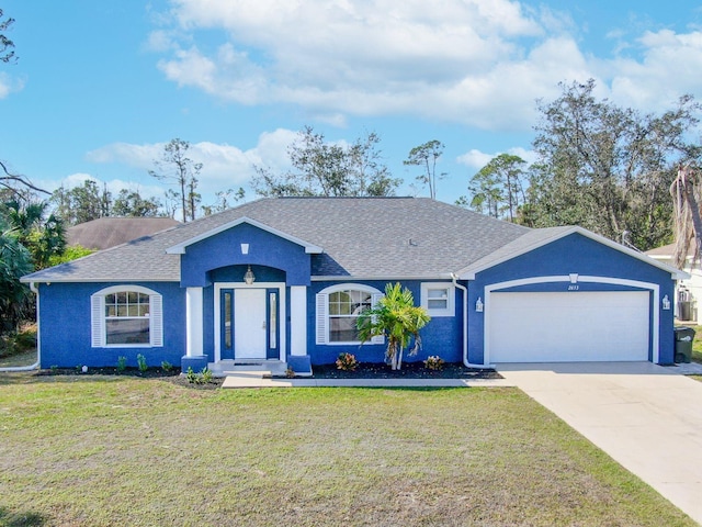 single story home with a garage and a front yard