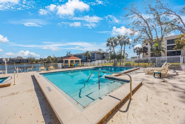 view of pool featuring a gazebo and a patio area