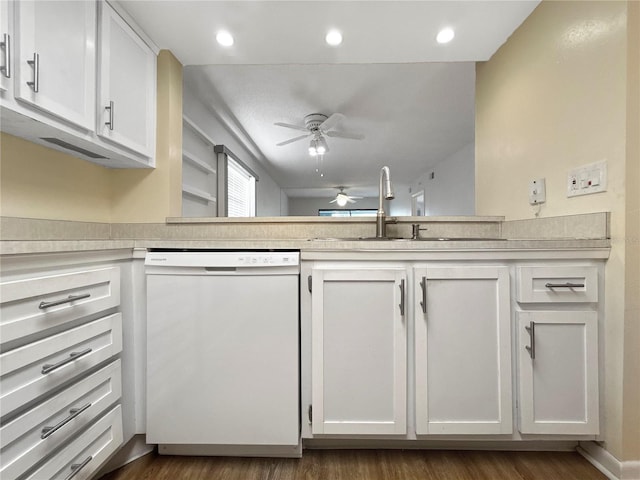 11485 Oakhurst Rd Unit A301, Largo, FL 33774 - kitchen with white dishwasher, a ceiling fan, light countertops, dark wood finished floors, and white cabinets