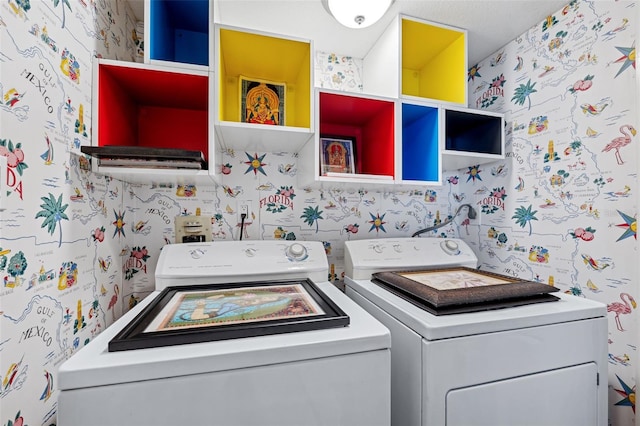 clothes washing area with independent washer and dryer