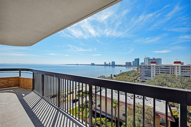 balcony featuring a water view